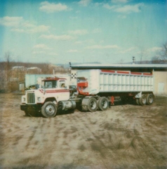 white and red tractor trailer