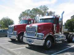 two red Titan tractors