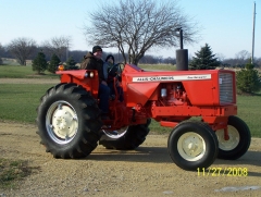 This is a tractor I tore down and repainted. That is my son 