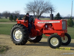 This is a tractor I tore down and repainted. That is my son 