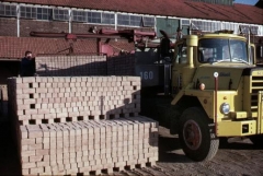 Mack DM600 loading bricks