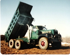 Mack 10 Wheeler drivers dump bigger loads........