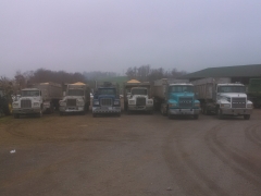 Macks at work on my farm hauling corn