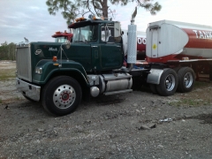 Front shot with the visor painted black and the old name off the door