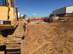 Forming manure pit walls