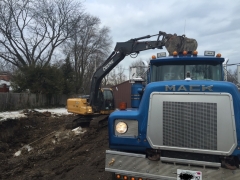 Loading out broken concrete on demo job