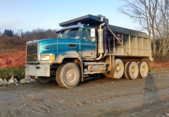 More information about "450 lbs of mud stuck under that truck"