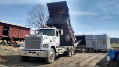 Unloading wheat.