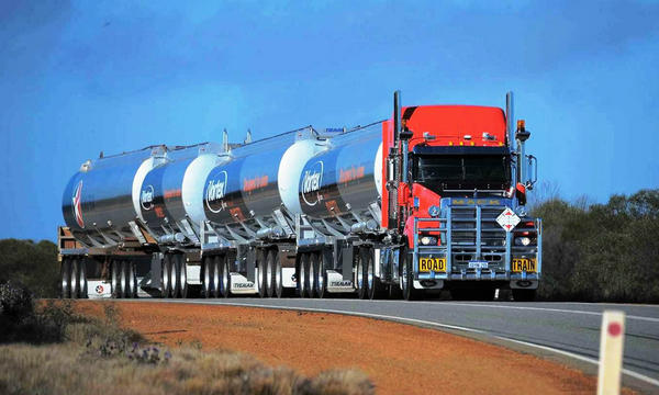 Mack Titan pulling FOUR tanker trailers.jpg