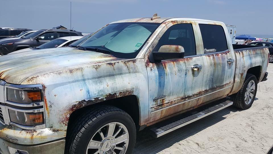 current-generation-chevy-silverado-gets-rusty-wrap-108184_1.jpg.3751606241b471355a4d8d1a2b19cf78.jpg